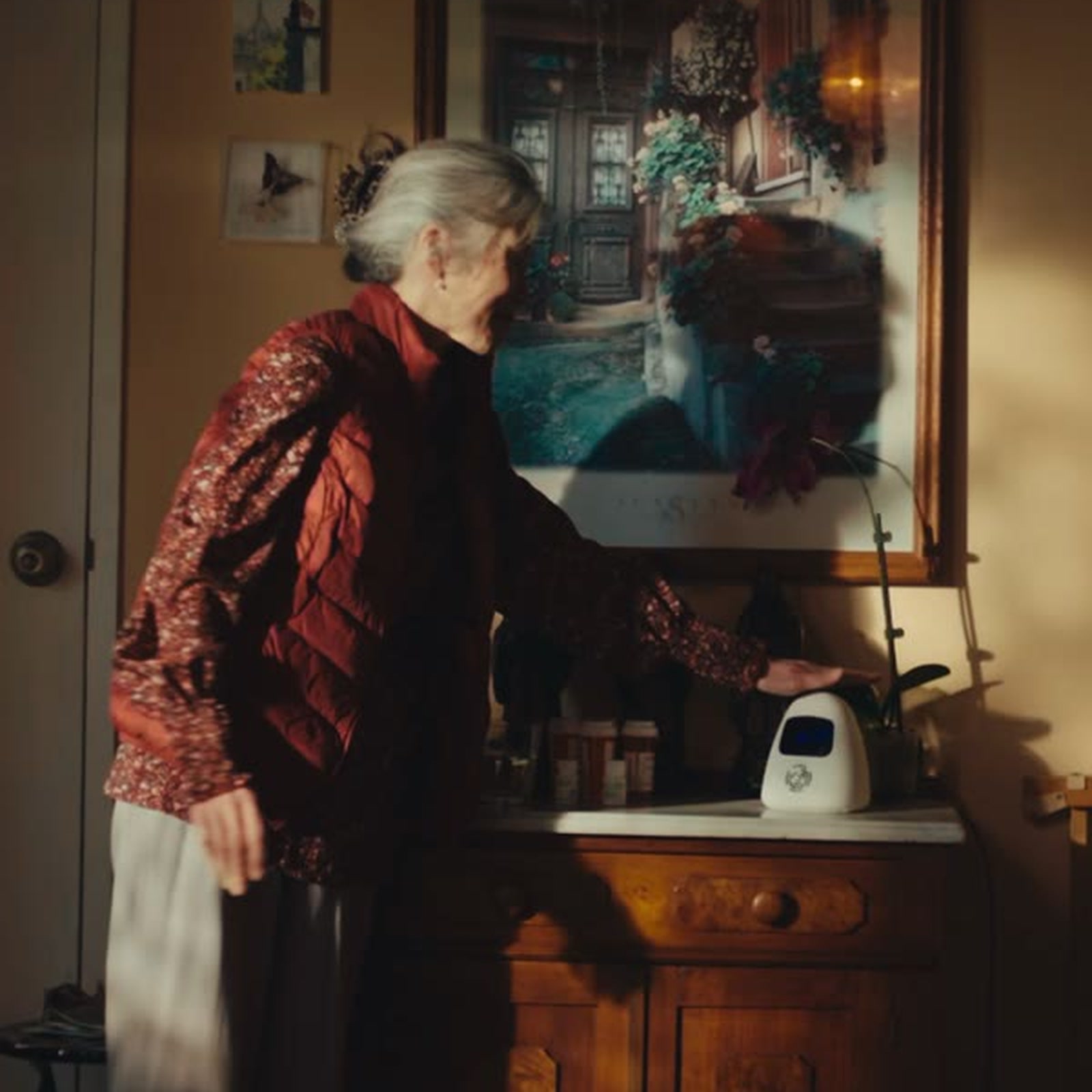 A senior with Sam at home